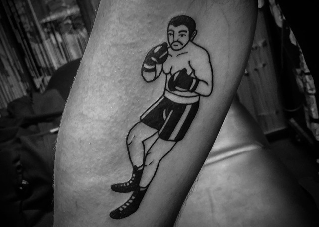 black boxer tattoo