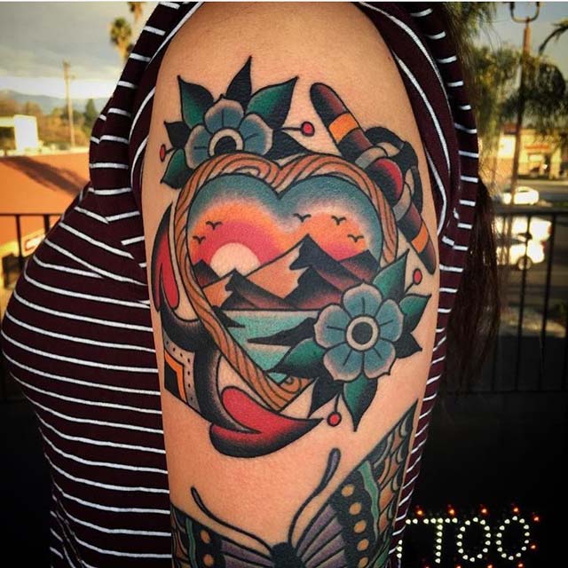 heart landscape otradtitional tattoo on shoulder