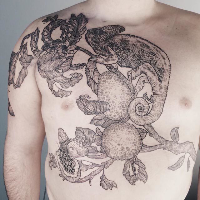 Chameleon tattoo on chest