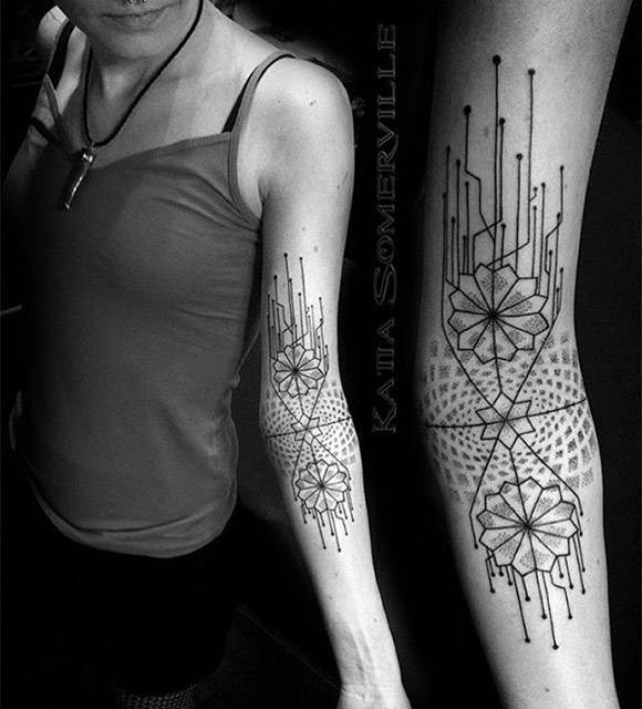 geometrical inner elbow tattoo