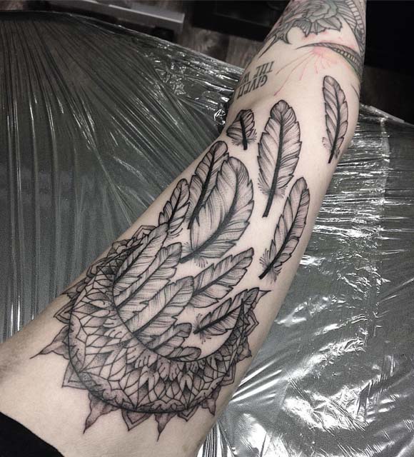 Feathers tattoo moon