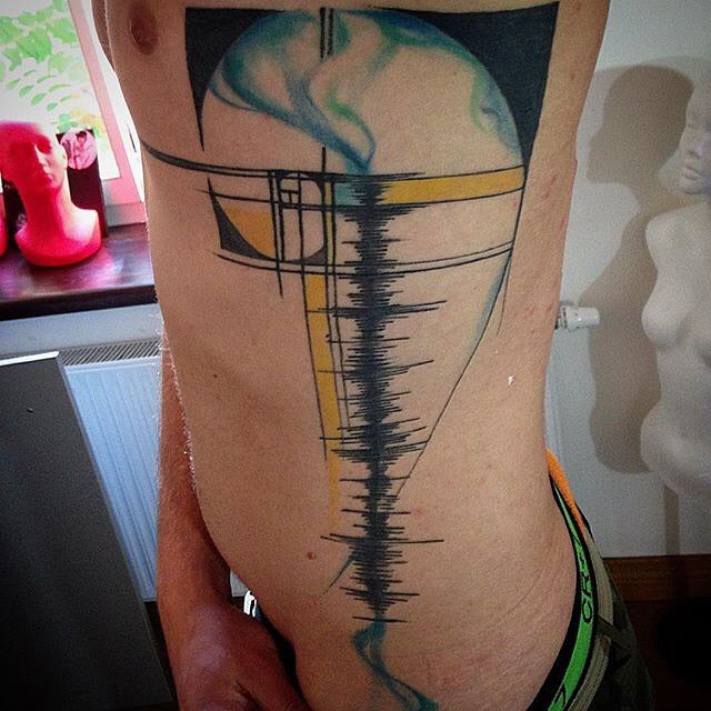 body side musical wave tattoo