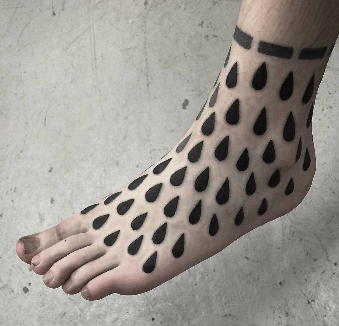 blackwork drops tattoo on foot