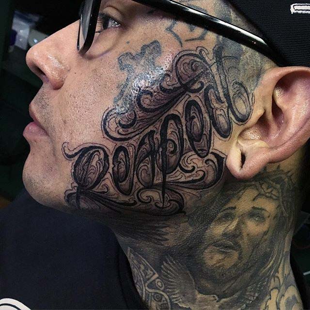 face lettering chicano tattoo