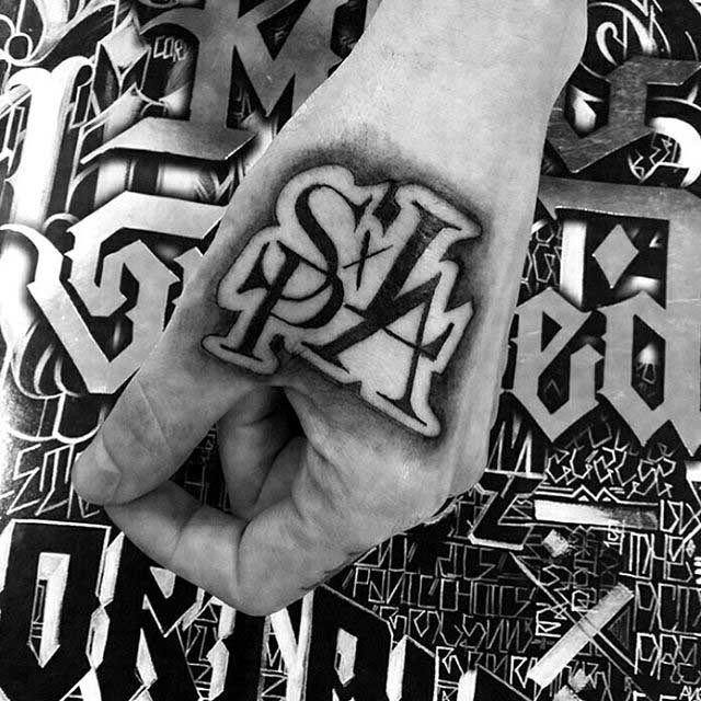 symbol hand tattoo Chicano