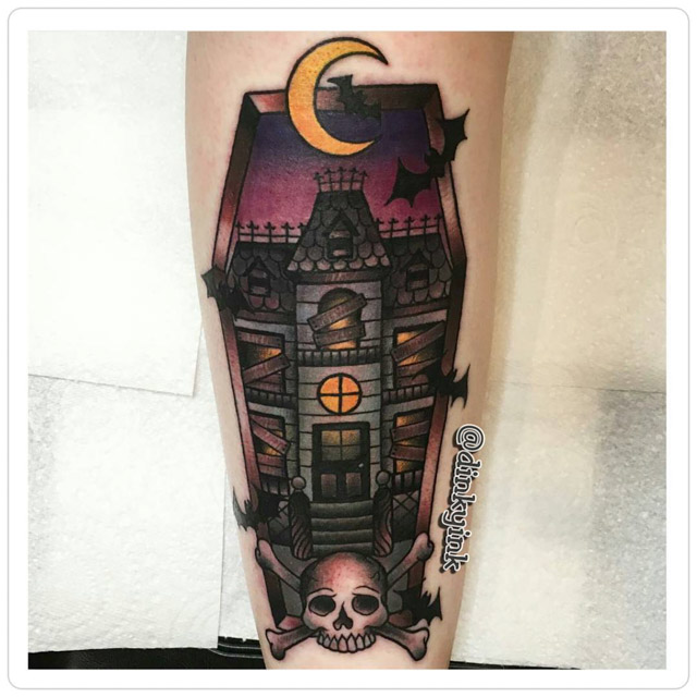 hounted house tattoo coffin-shaped