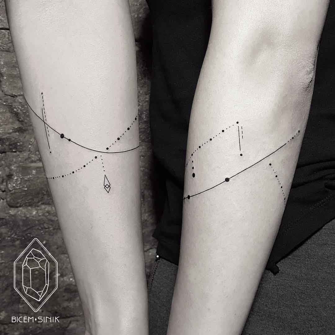 dots and lines ornament tattoo