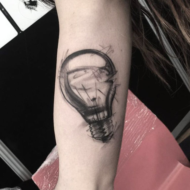 grey light bulb tattoo