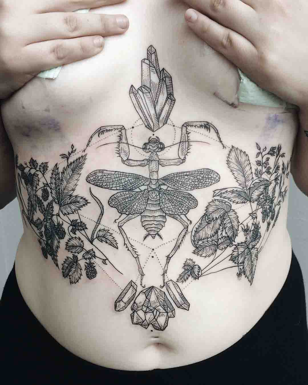 praying mantis tattoo on stimach