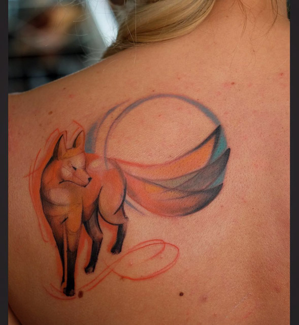 red fox tattoo on shoulder blade