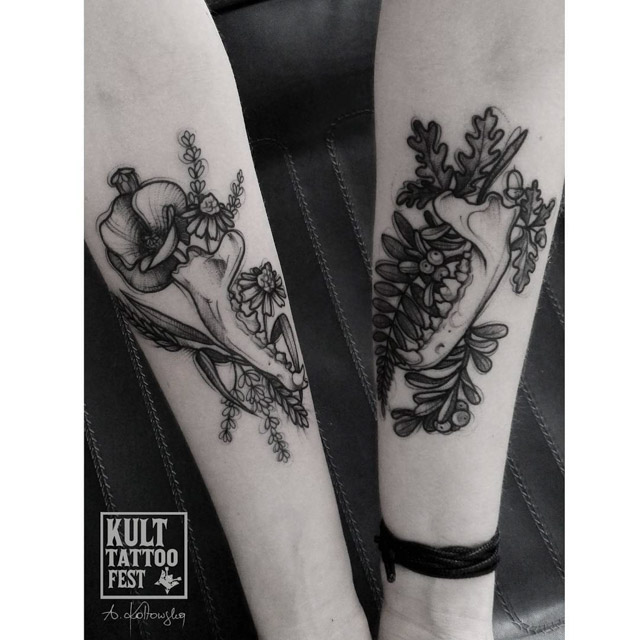 forearms tattoos of wolf jaws with flowers
