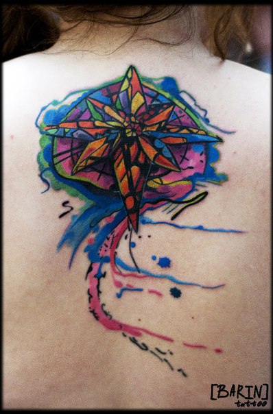 Watercolor wind rose tattoo on back