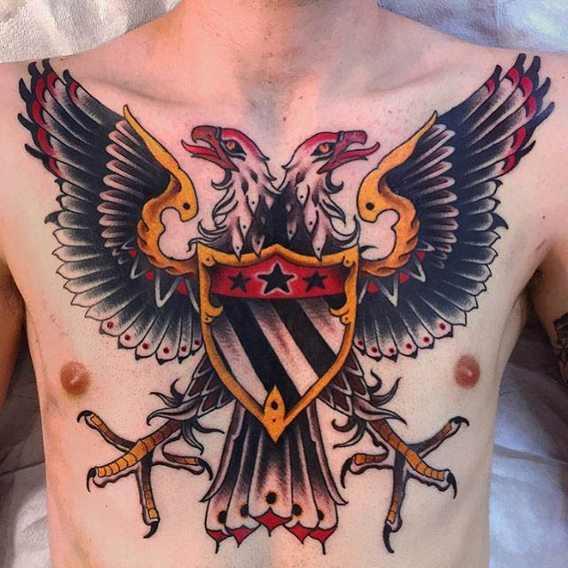neo-traditional chest tattoo eagle with two heads