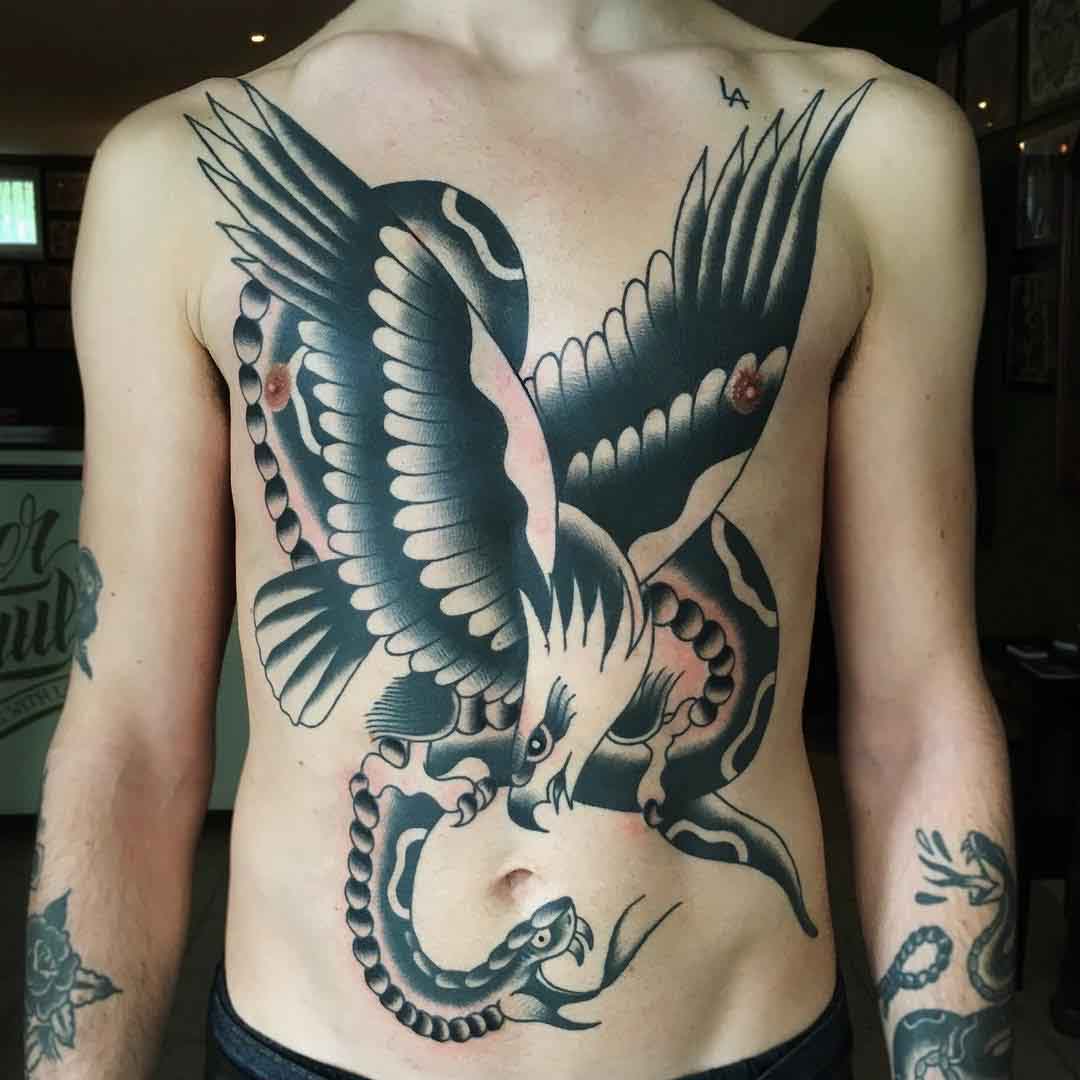 torso tattoo eagle snake fight