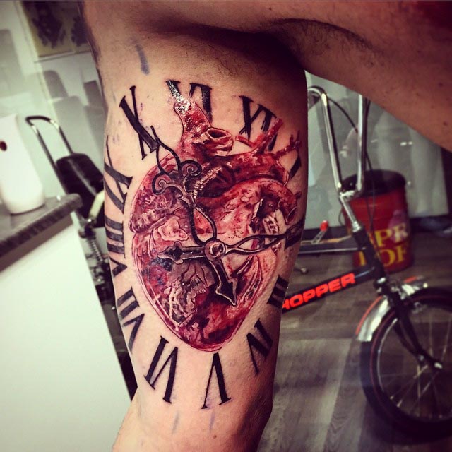 Heart Clock Tattoo on Bicep by the_mad_tatter_