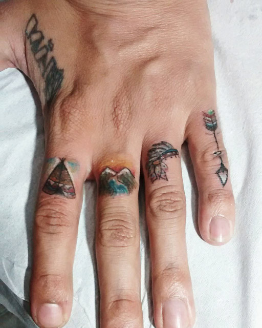 Indian Tattoos on Fingers by Henrique Torres