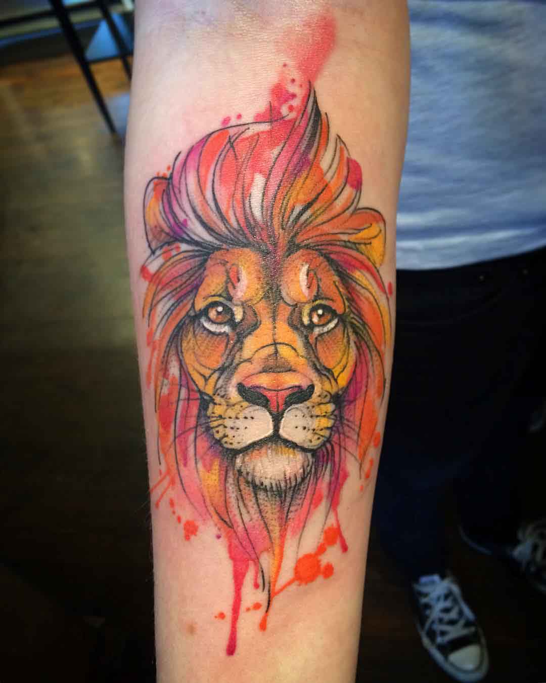 arm watercolor tattoo lion