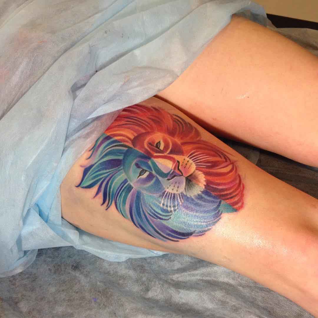 lion head red and blue tattoo