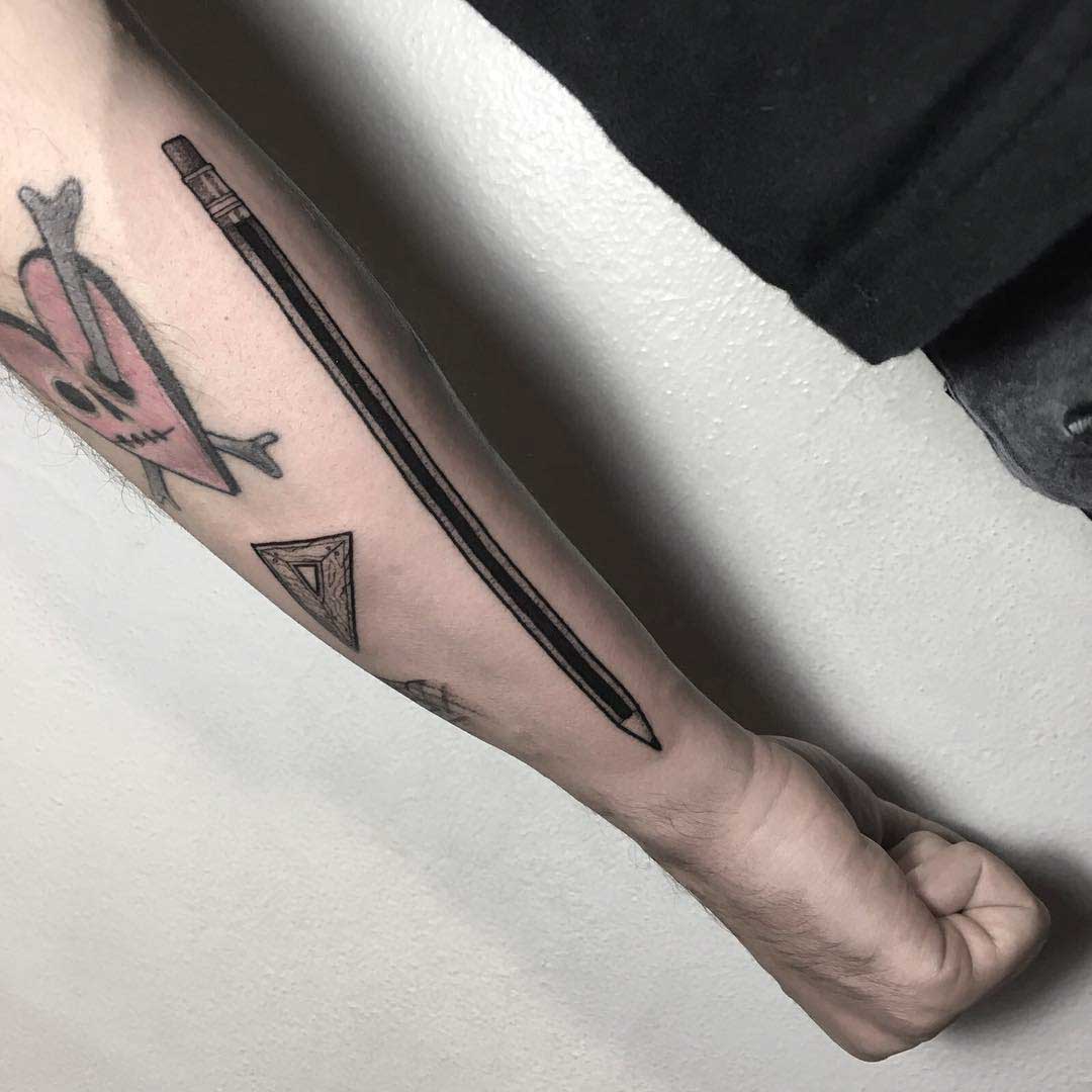 pencil tattoo on arm