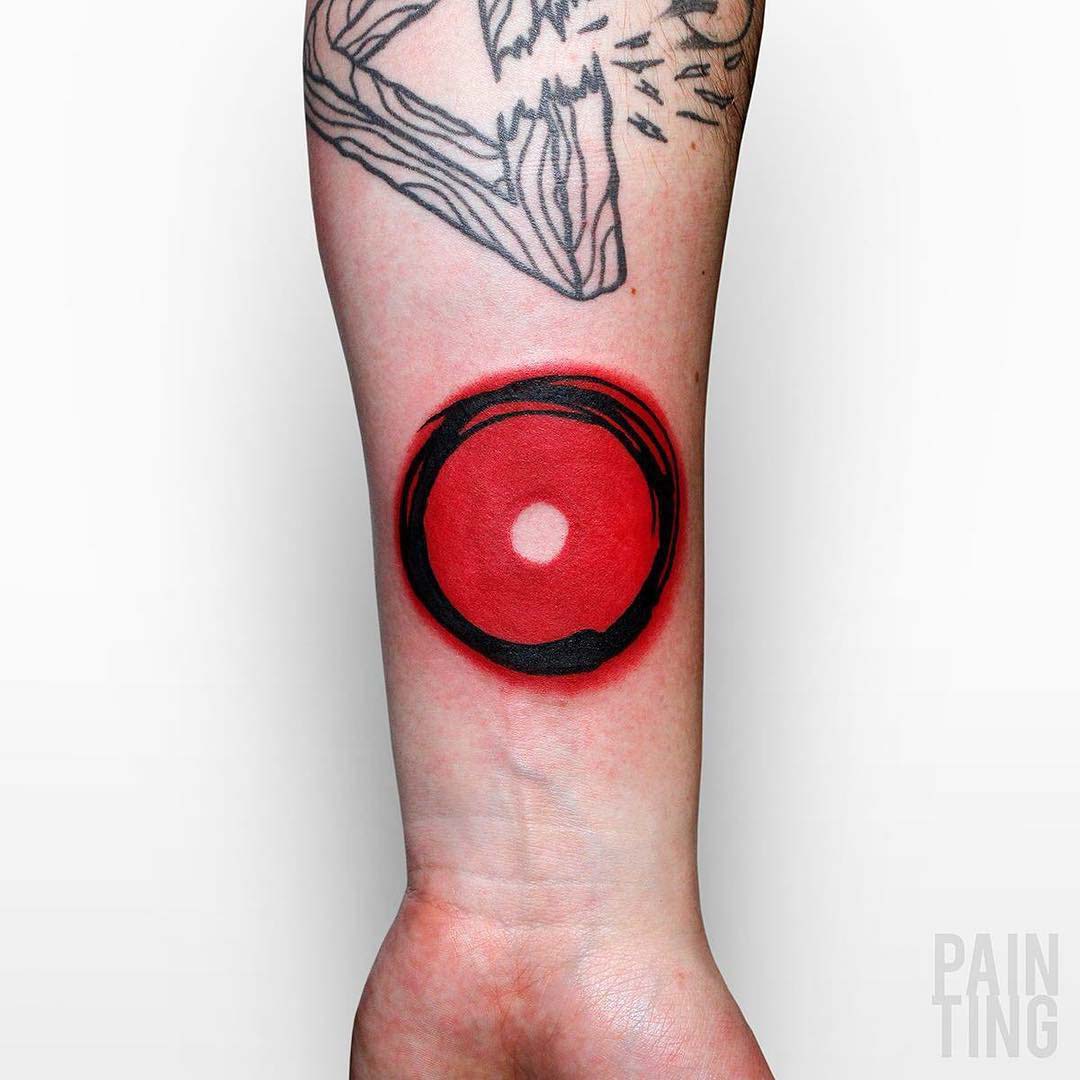 arm tattoo circle sun