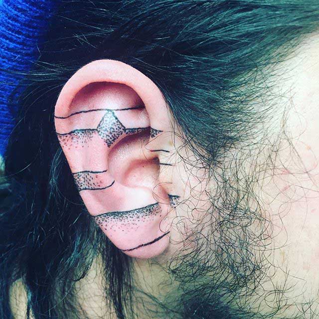 Tattoo on Ear Cartilage by @theleoux