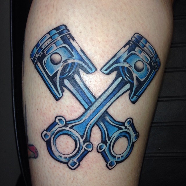 Crossed Pistons and Flames tattoo