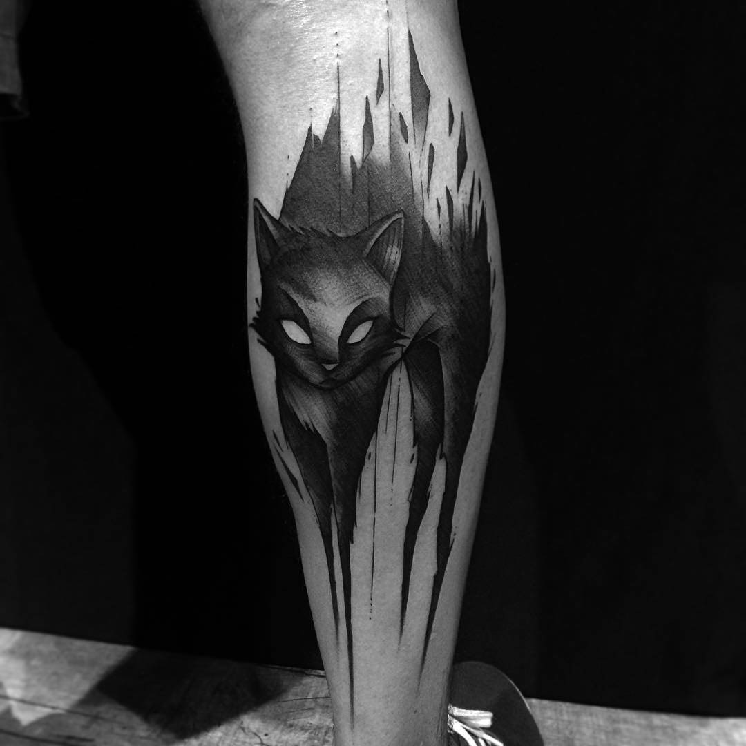 demonic cat tattoo on leg