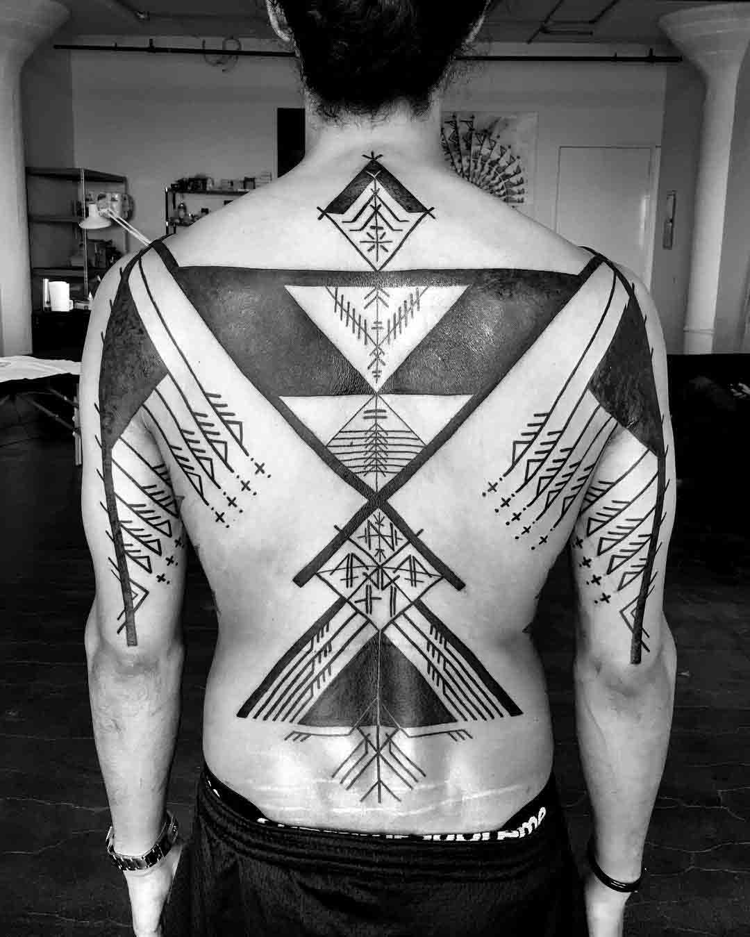 blackwork ethnic pattern tattoo on full back