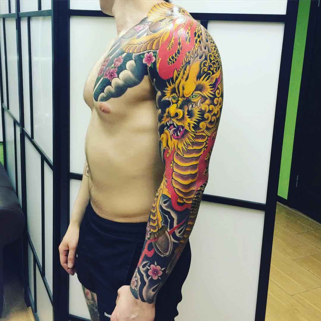 golden dragon full sleeve tattoo