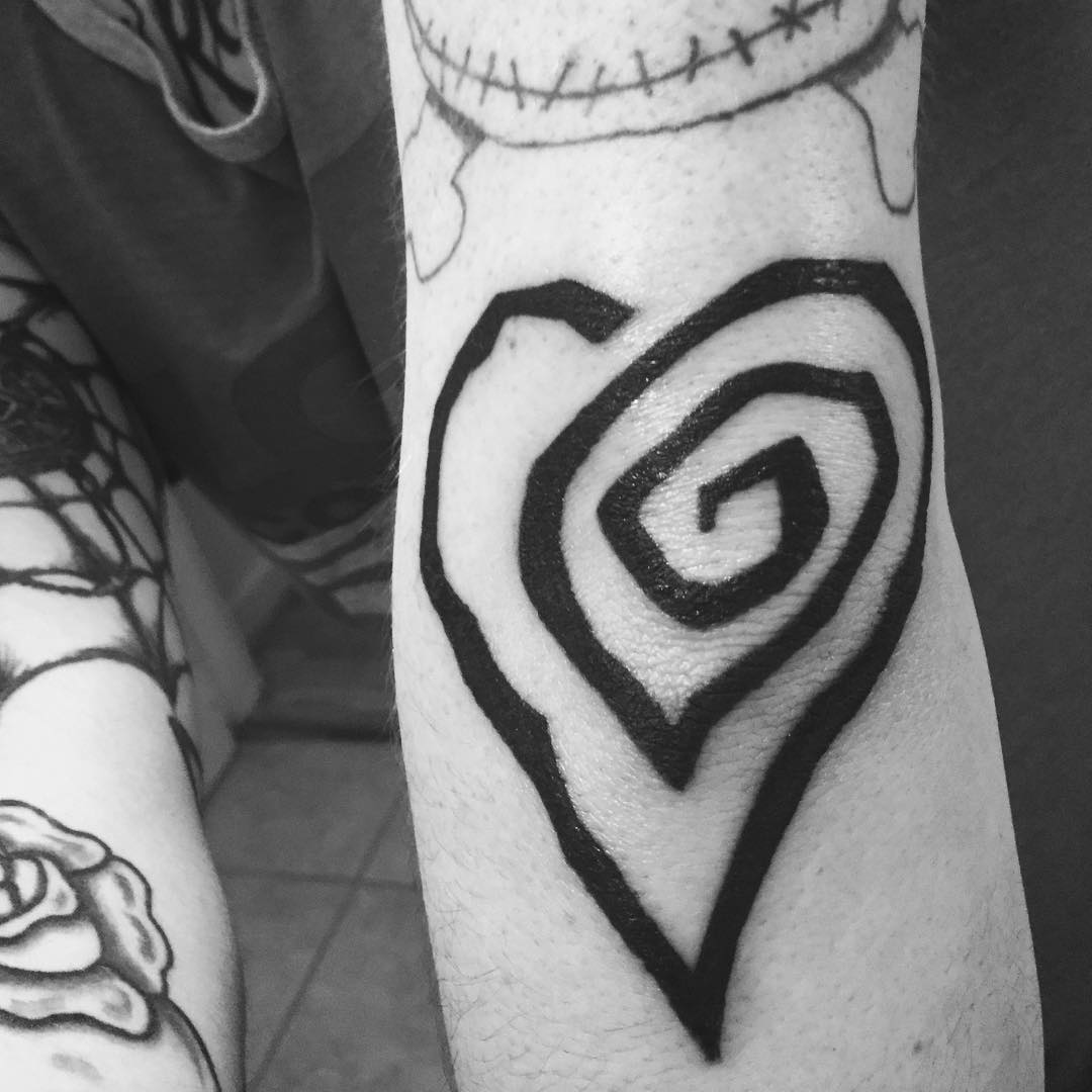 swirly heart tattoo