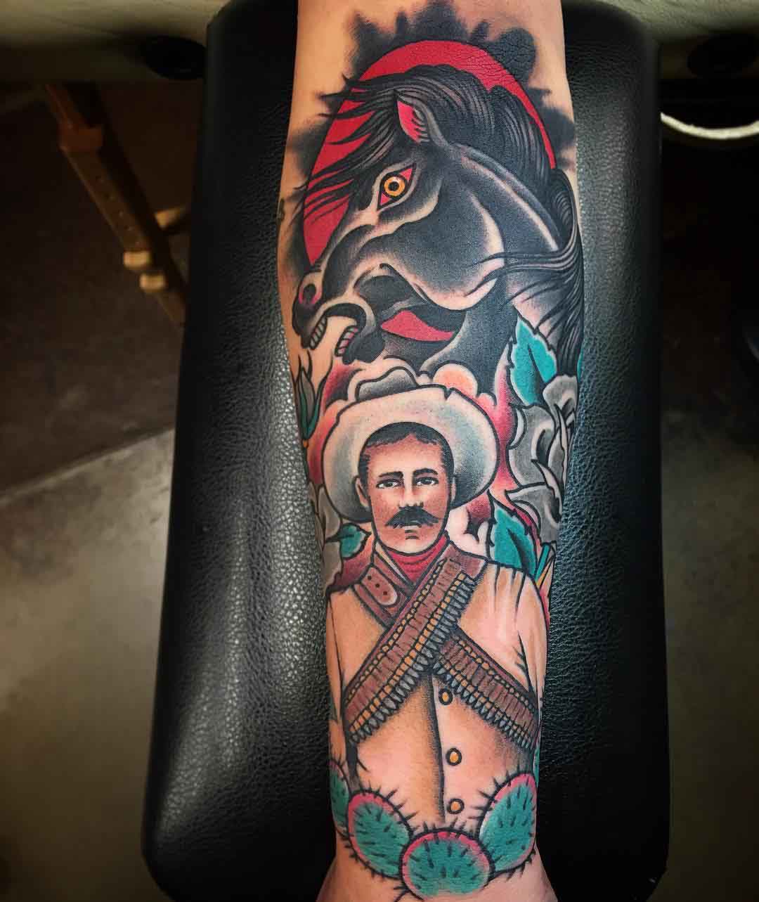 western themed traditional tattoo on arm