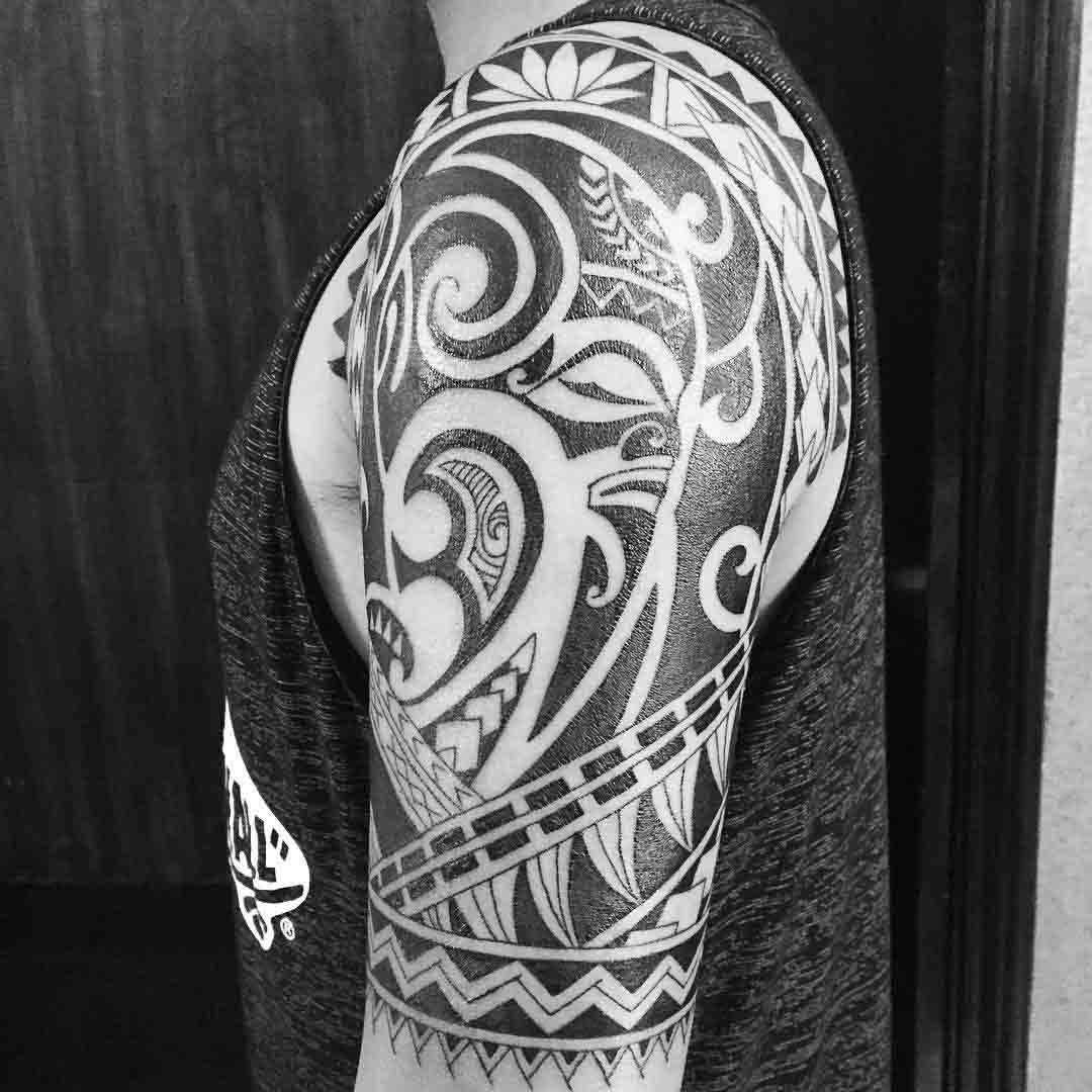 Tribal Half Sleeve Tattoo by balitattoostudio