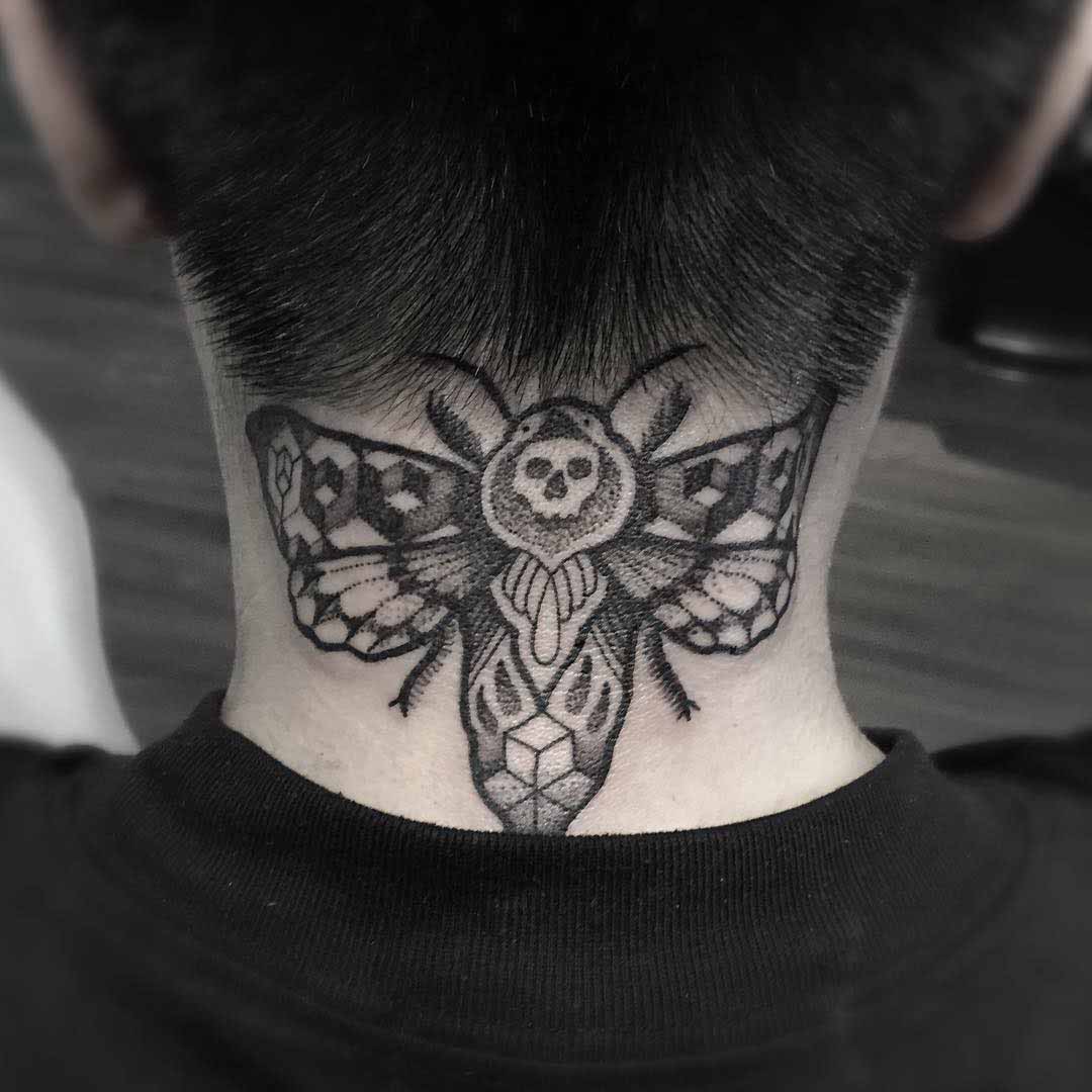 butterfly tattoo on back of neck