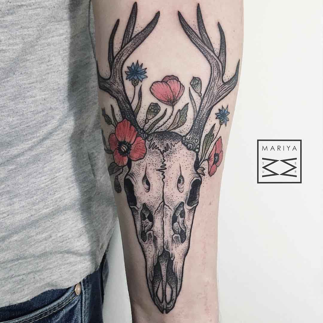 arm tattoo skull deer