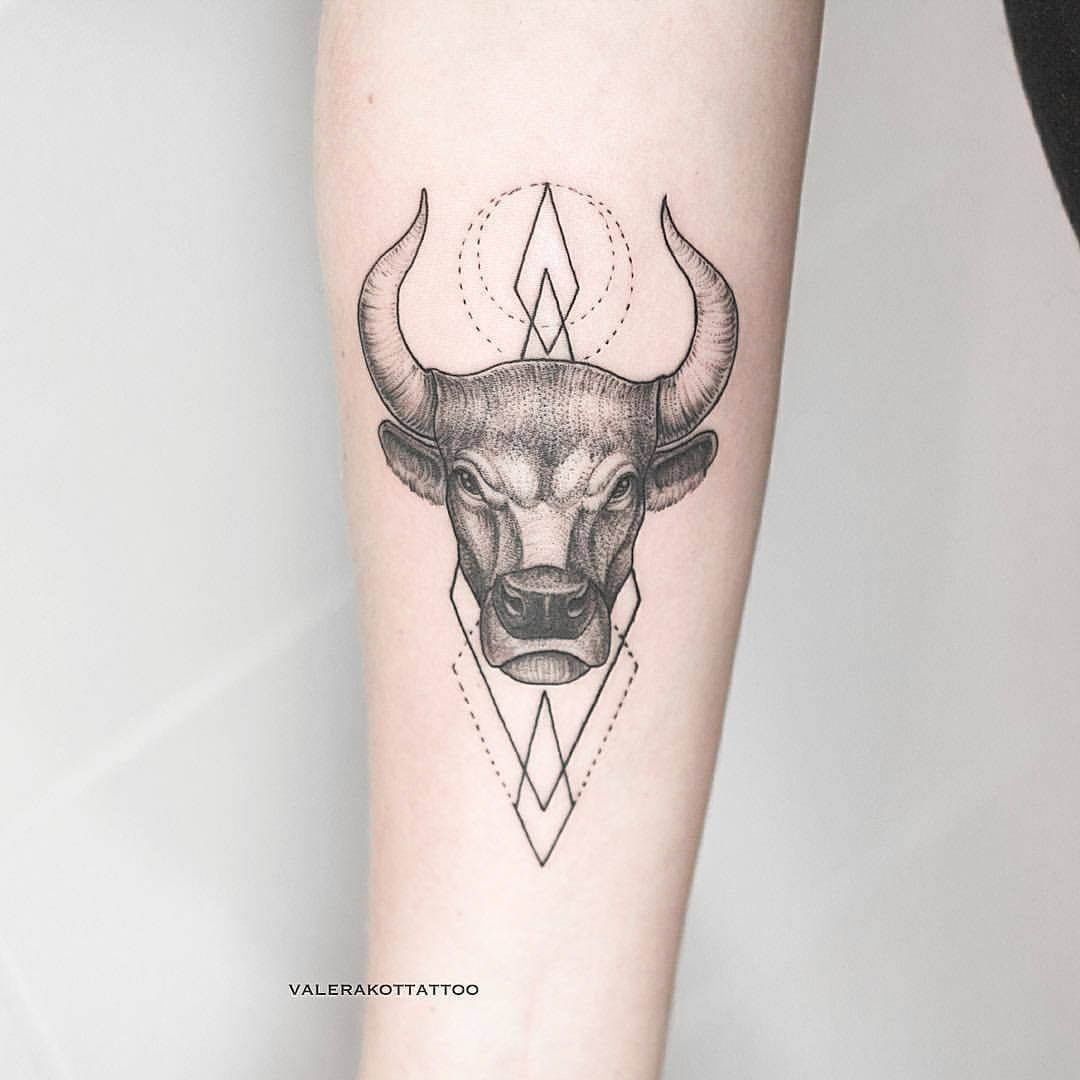 bull tattoo on arm