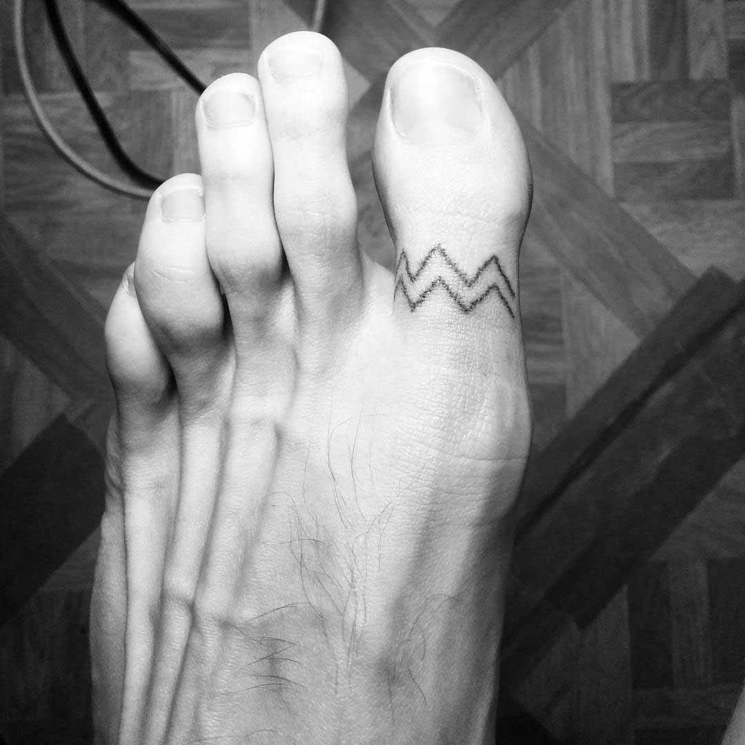 Aquarius Toe Tattoo by Doneslowly