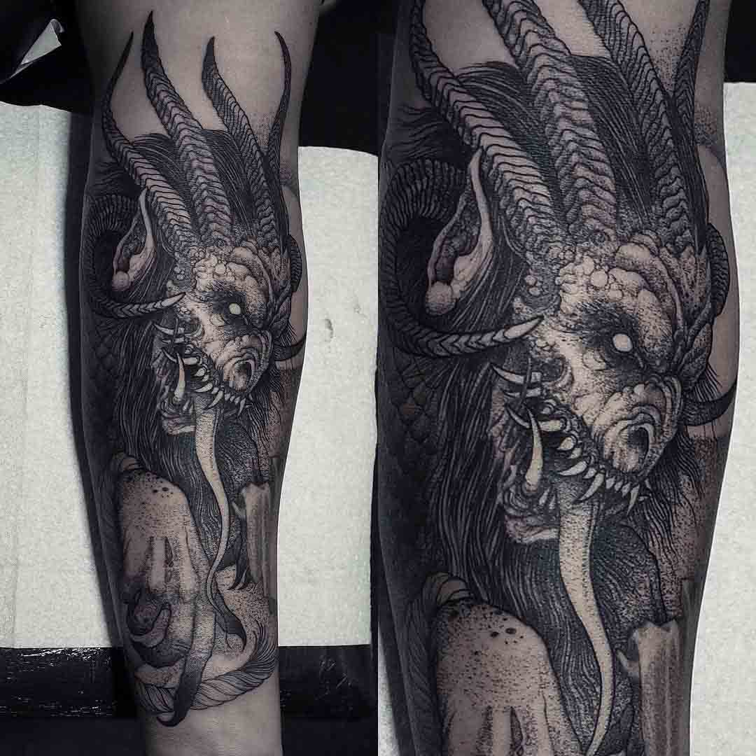 forearm tattoo demon