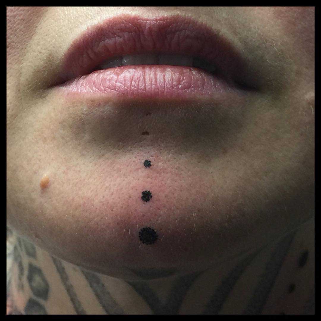 Four Dots Tattoo on Chin by gemmaellerby
