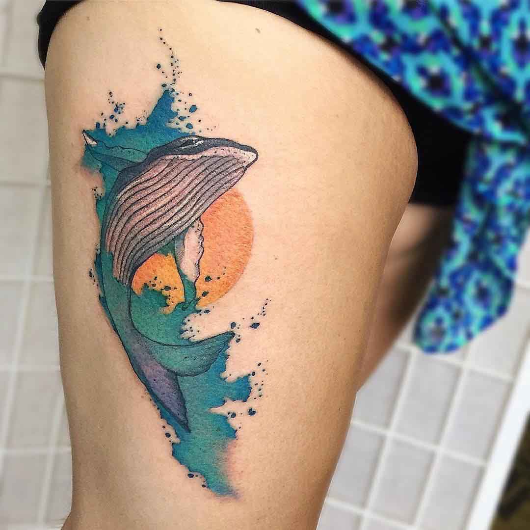 watercolor whale tattoo on thigh