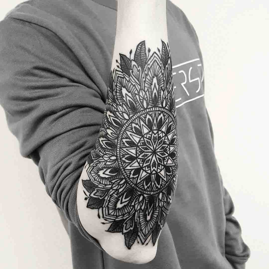 outer forearm tattoo mandala