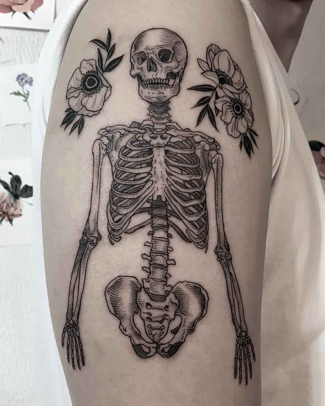 shoulder skeleton tattoo with flowers