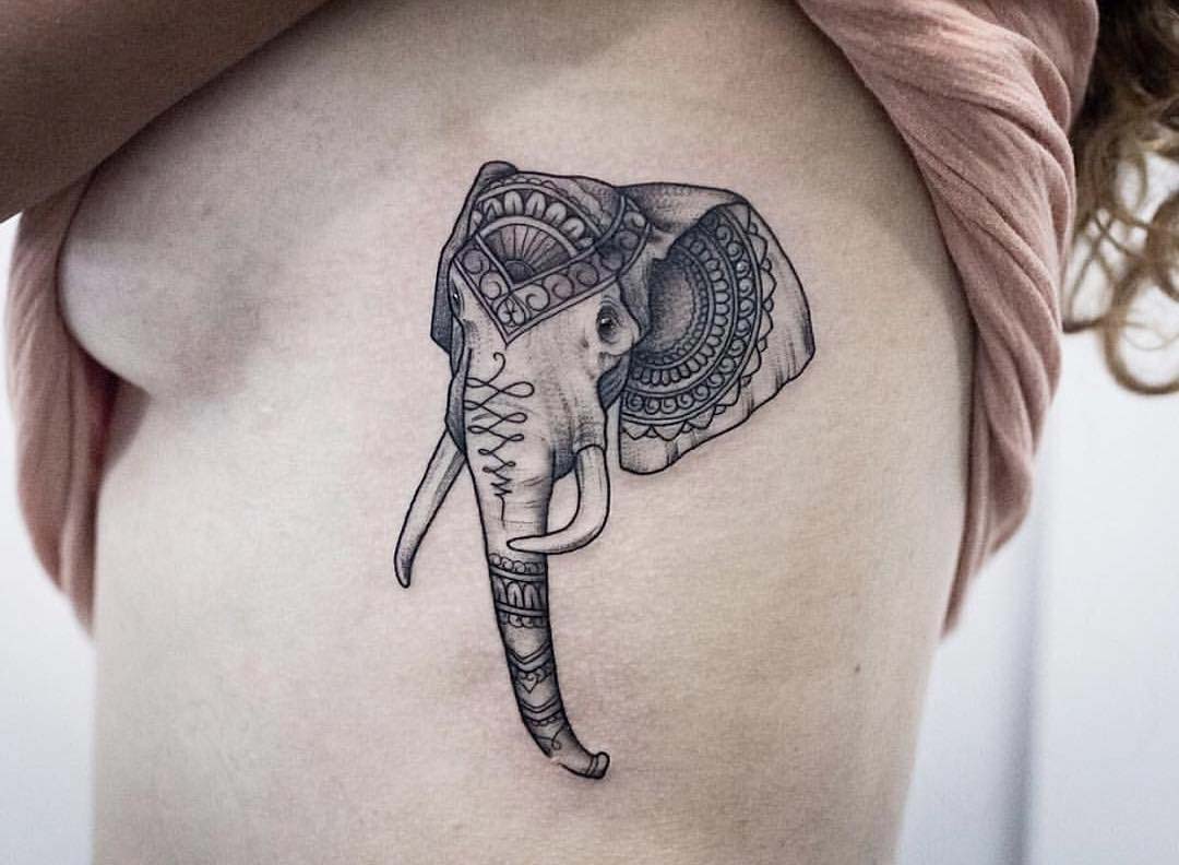 ribs tattoo elephant head