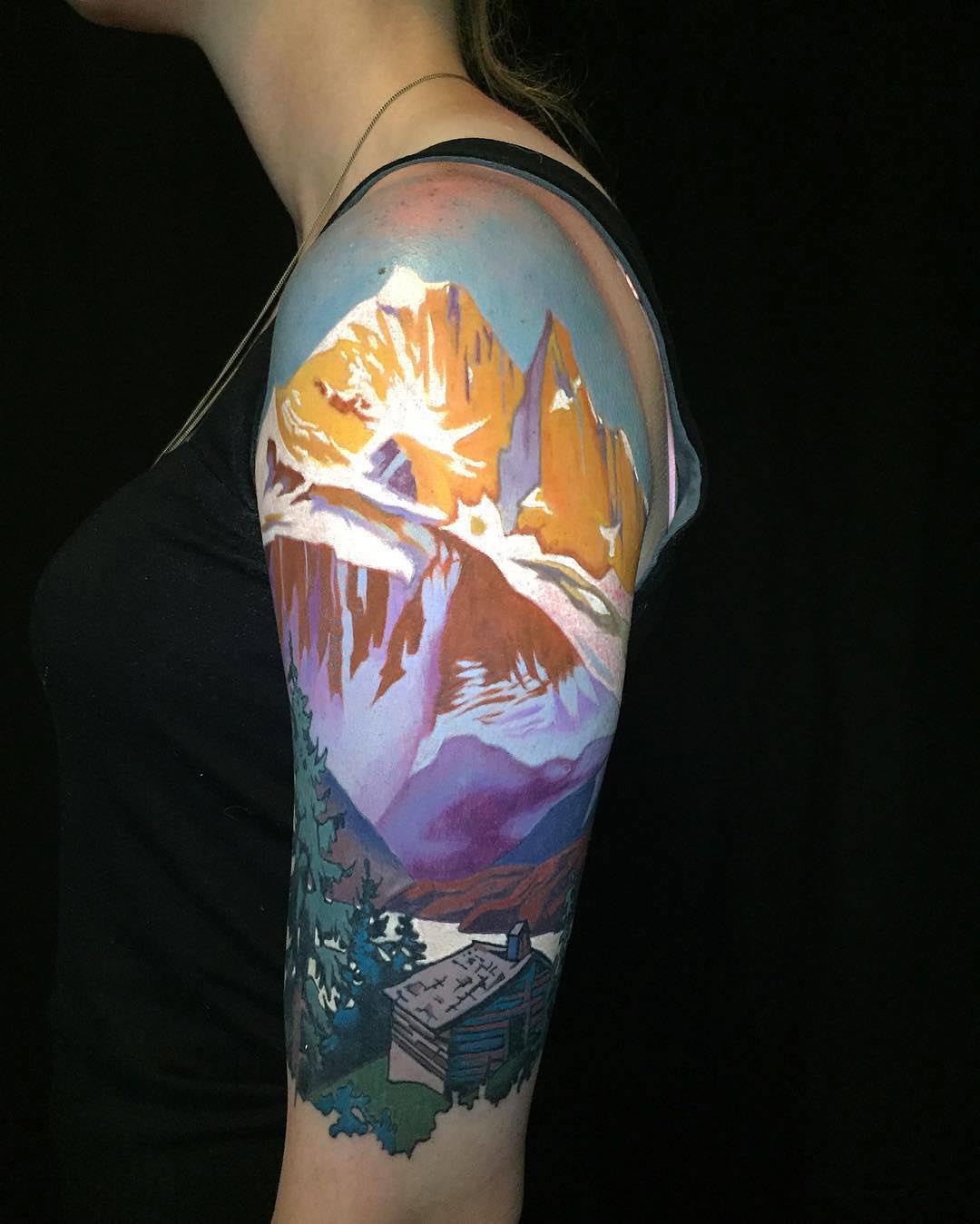 mountains tattoo on shoulder