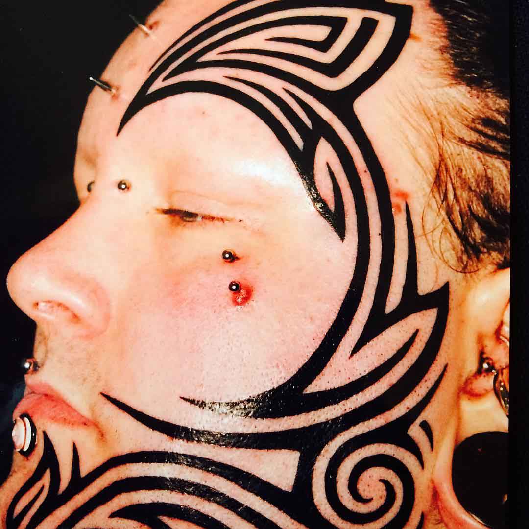 Tribal Face Tattoo by black_wave_tattoo