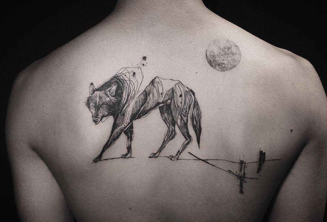awesome wolf tattoo on back