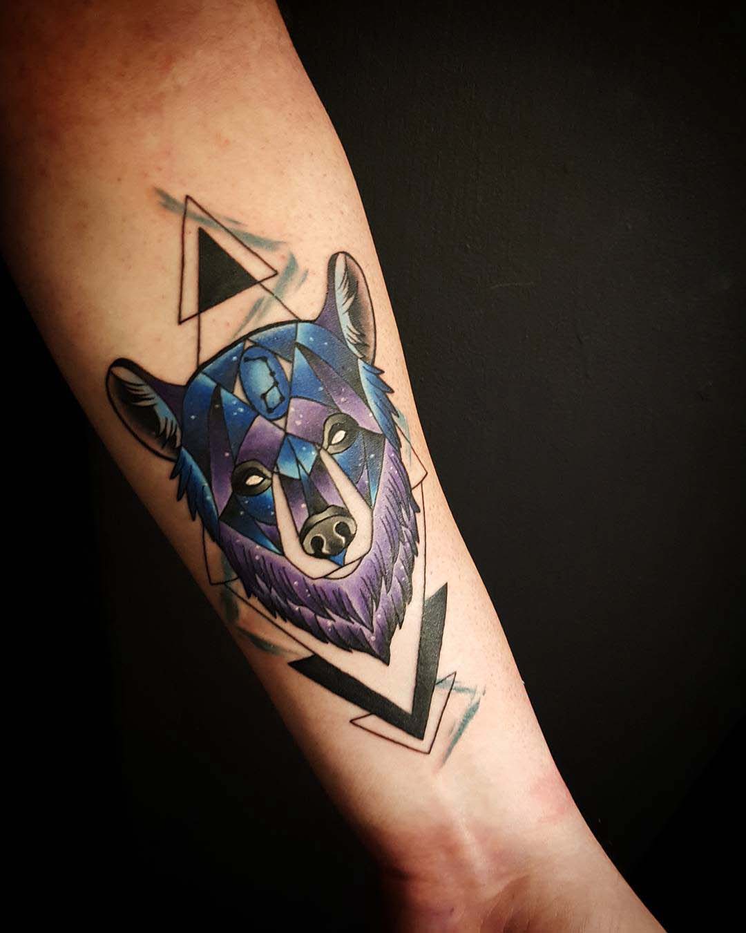 arm tattoo bear face