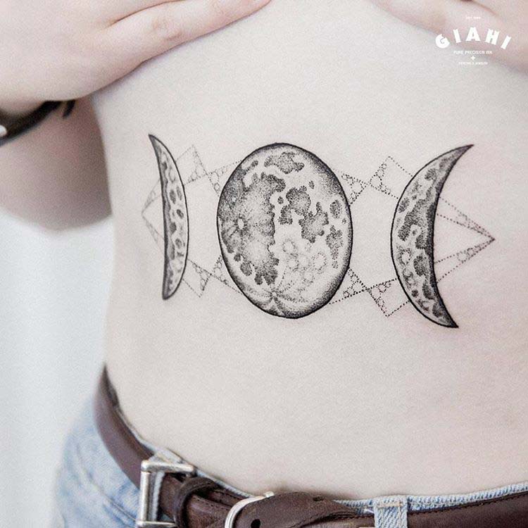 stomach tattoo moon