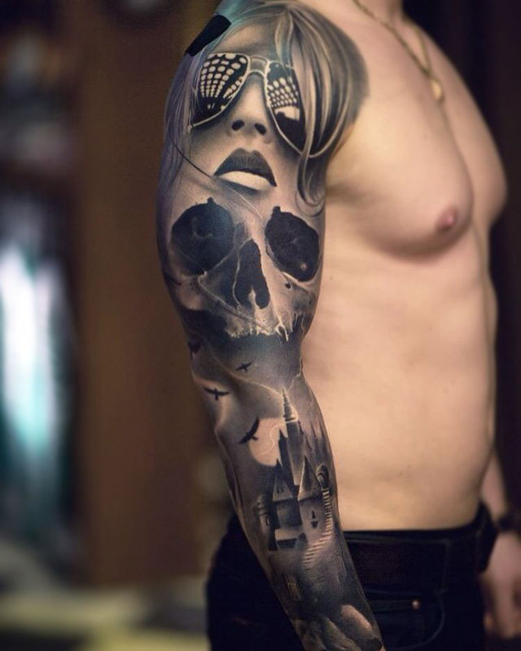 black and grey full sleeve tattoo