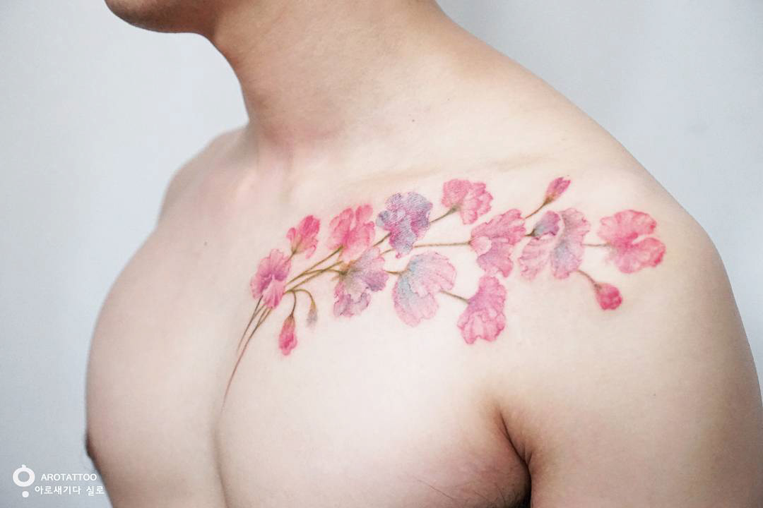 chest to collar bone tattoo flowers