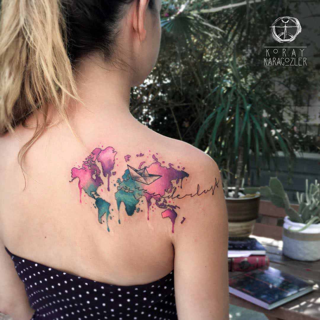 shoulder blade tattoo world map watercolour style